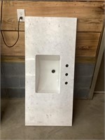Four foot marble top single sink chip on edge s