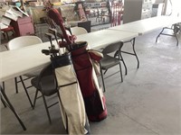 Two sets of left-handed golf clubs