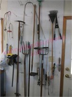 Tools on wall (2 moles traps-pitchfork-misc tools)