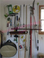 Tools on wall (giant rake-tree pole saw-misc)