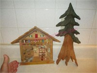 Hand carved wall decorations (house & tree)