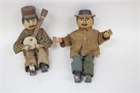 TWO CARVED WOODEN SPRING JOINTED PUPPETS