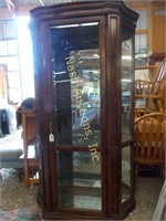 lighted bow front curio cabinet w/ bevelled glass