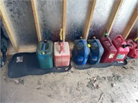 (6) LARGE GAS CANS WITH (2) UTILITY TRAYS INCLUDED