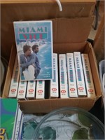 Box of Miami Vice VHS tapes
