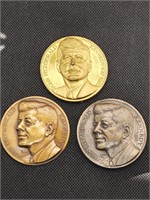 Three vintage John F Kennedy Inaugural medals.