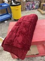 Gently used cranberry red weighted blanket.