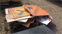 Pile Of 35 Construction Signs + Stands