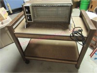Vintage electric heater & a rolling tv cart (bsmt)