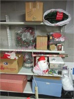 Lot of Christmas decorations on shelves (bsmt)