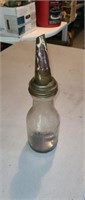Antique one liquid quart glass oil filler bottle
