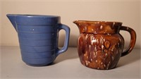 Ceramic pitchers. Each is 5".