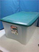Nice Sterilite storage tub with green lid