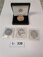 4 assorted medals / coins
