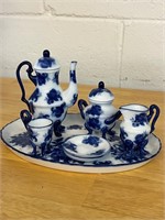 Blue Floral Design over White tea set on platter