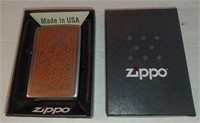 f8) new Zippo cigarette lighter in box. Orange