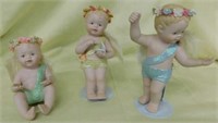 Set of 3 bisque angelic figurines, 7" tall: one