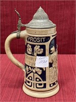 Cobalt stoneware beer stein with pewter lid in