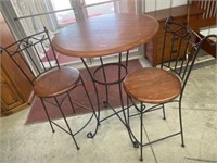 Bistro pub table and 2 stools.