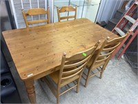 Knotty pine table and 4 chairs