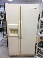 Whirlpool side-by-side refrigerator with ice and
