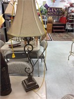 Table lamp with scroll base