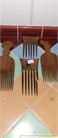 Four Wooden Combs, 1 damaged
