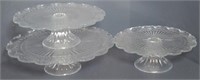 Three glass cake stands. Largest Measures