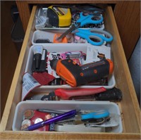 Contents of drawer. Including a black and decker