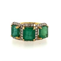 18ct YG emerald cut emerald (7.24ct) & dia ring