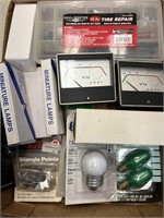 Box with Miniature Lamps, Couple of Gauges, Tire