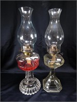 TWO GLASS PEDESTAL BASE OIL LAMPS