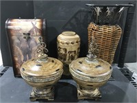 Variety of containers and vases. Two have a