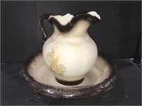 Large ceramic basin and pitcher. Basin is approx.