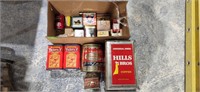 Box filled with assorted antique tins