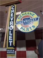 2 Chevrolet advertising signs