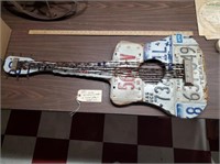 License plate guitar w barbed wire strings