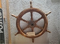 Old nautical wooden ship's wheel