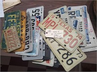 40 old license plates, mostly Texas