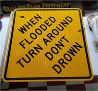 Road sign When Flooded Turn Around Dont Drown