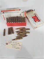 28 rounds Winchester 7mm ammo + 4 empties