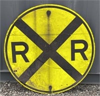 (CC) Yellow Railroad Crossing Sign. 
(Approx.