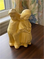 Vintage yellow boy girl pottery