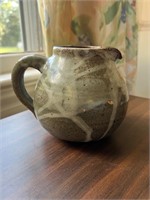 Signed glazed pottery pitcher