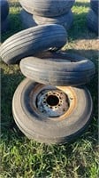 Three farm implement tires