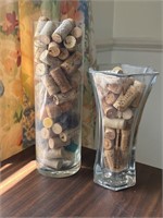 2 vases full of corks