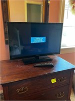 Small 27 inch insignia television and remote