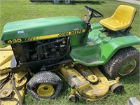 John Deere 430 lawn tractor with wheel weights.