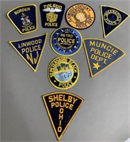 Lot-Embroidered Police Badges as Found