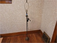 Antique floor lamp. 60ins. New harp and socket.